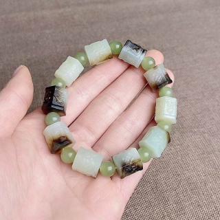 李默然戴和田玉手串后气质大变